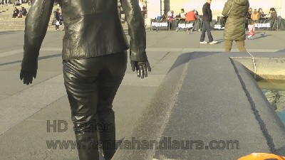 Jenny-putting-on-girls-leather-boots-in-leather-pants